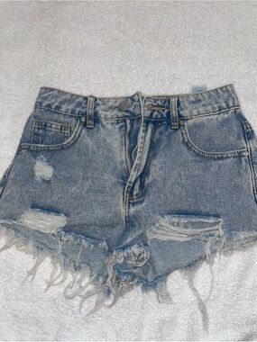 High-Rise Light Blue Distressed Denim Shorts